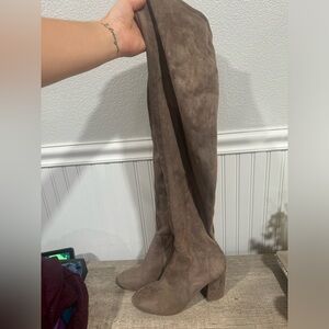 Thigh high heeled boots
